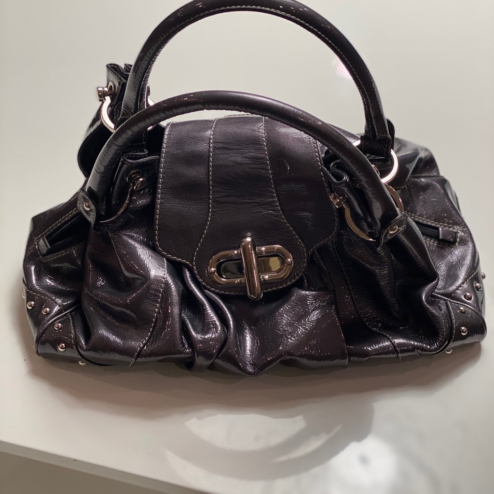 Never carried patent silver leather